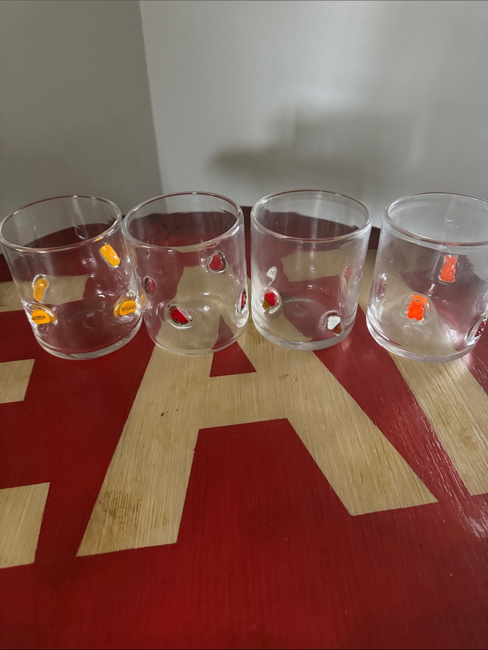Drinking glasses with different design designs on them